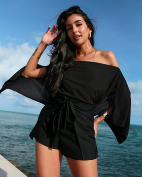 Black_model1 Des:Model is 5’8” DD Cup and wears size S and US 4