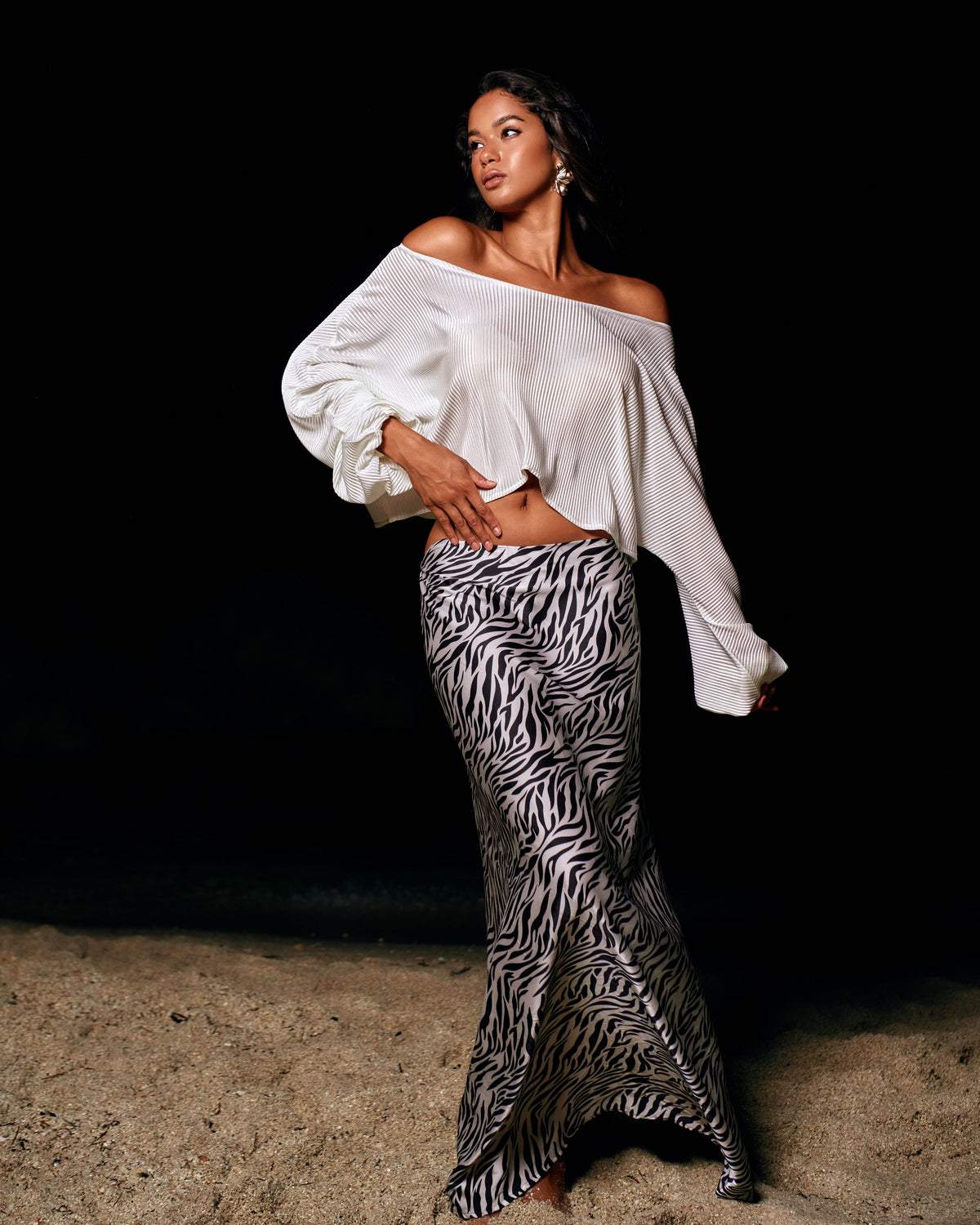 Savannah White_model1 Des:Model is 5’9” DD Cup and wears size S-M and US 4